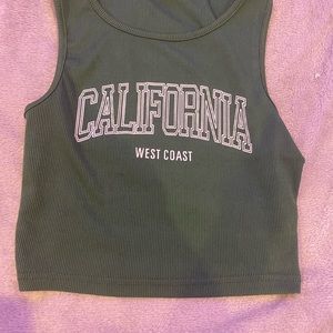 Green tank with white lettering